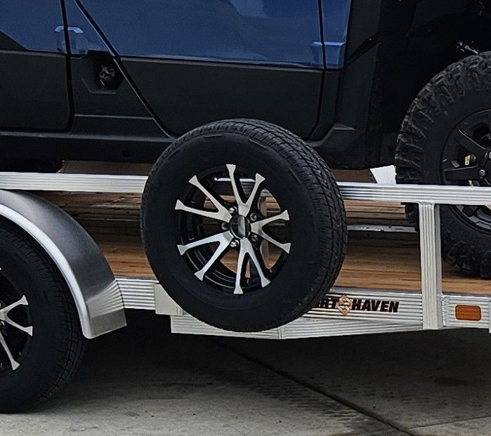 trailer with lateral side load ramp