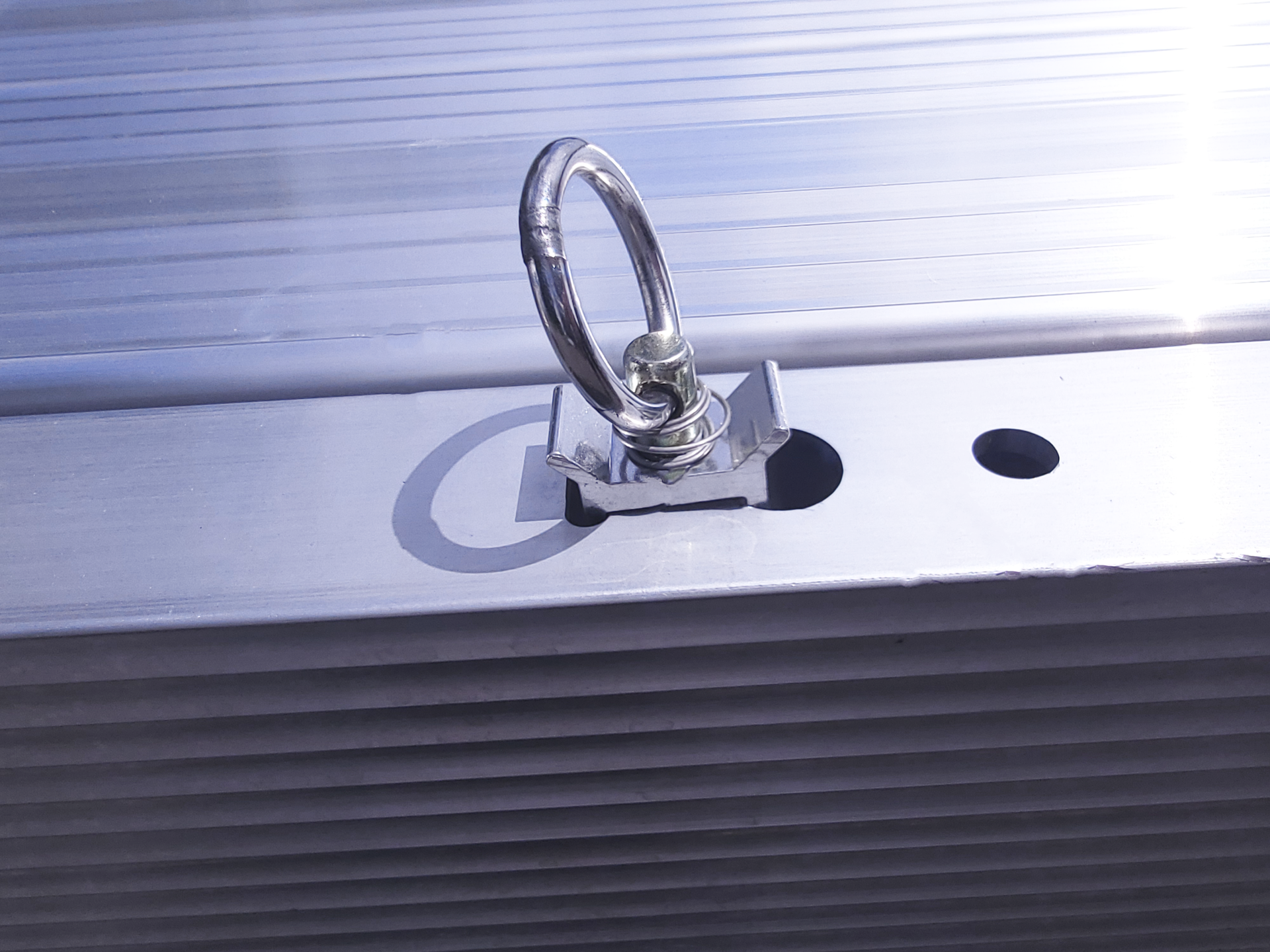 tie down rings in slot of trailer