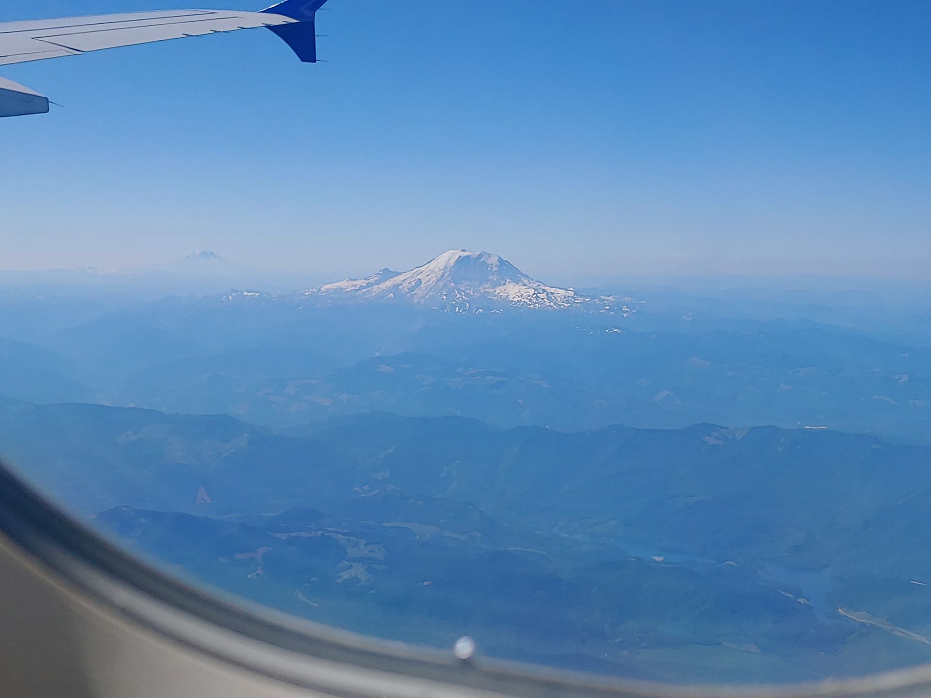 A mountain as seen from a plane's window