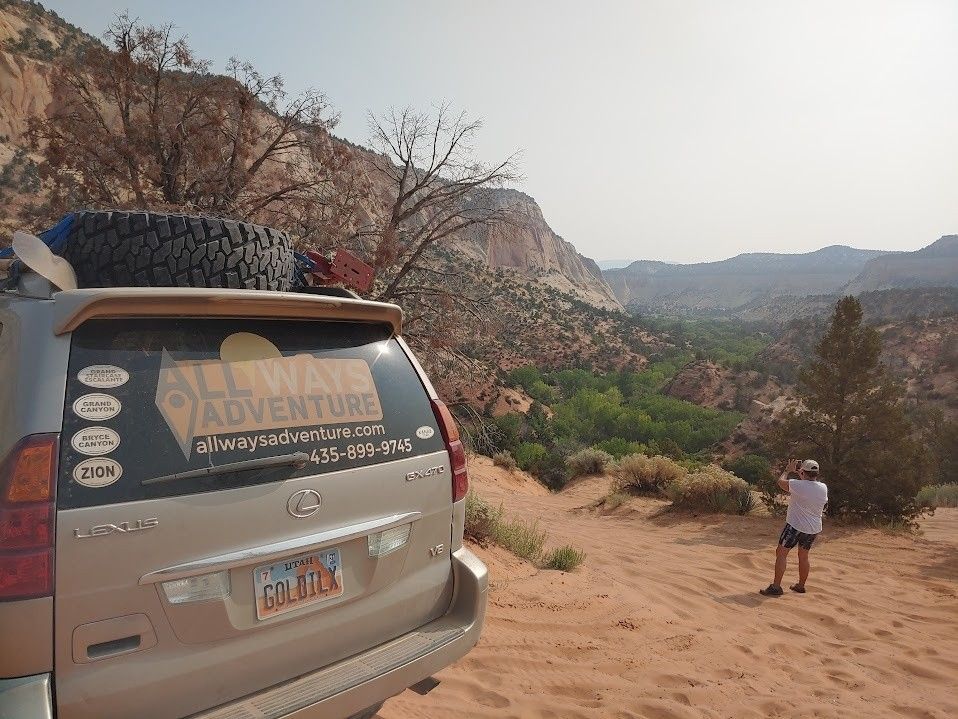 A car with the word adventure on the back