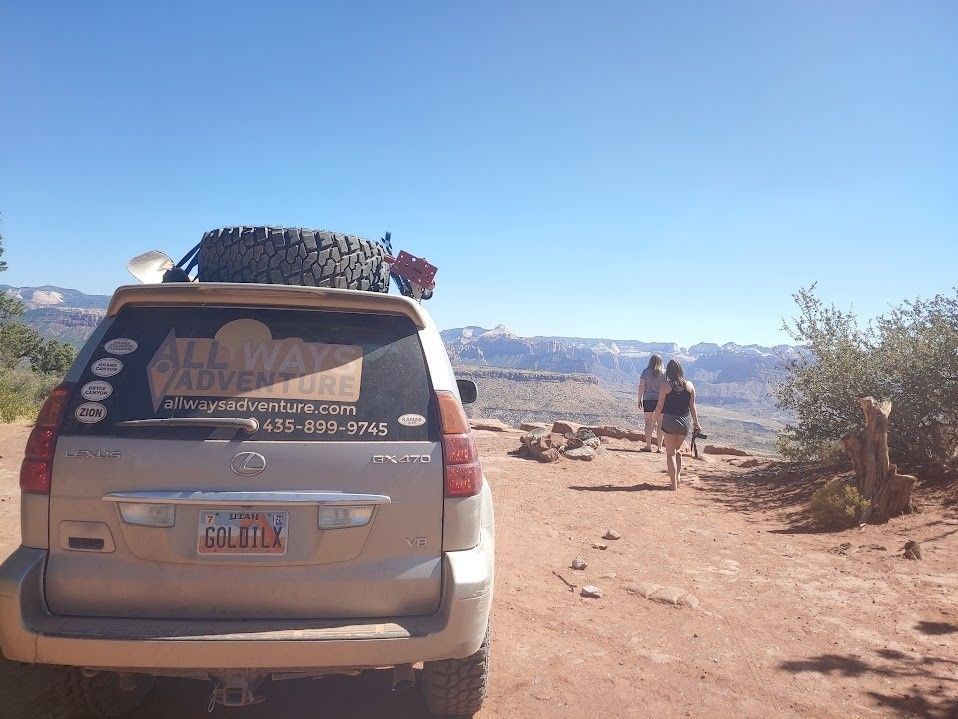 A car with a sticker on the back that says all way tours