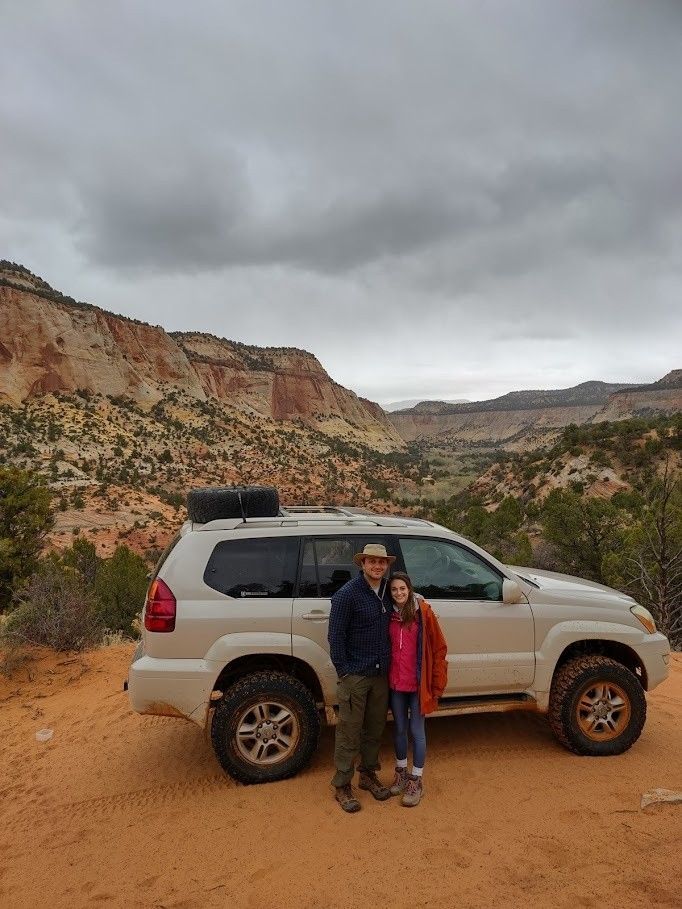 Couple with their car in East Zion Geology.