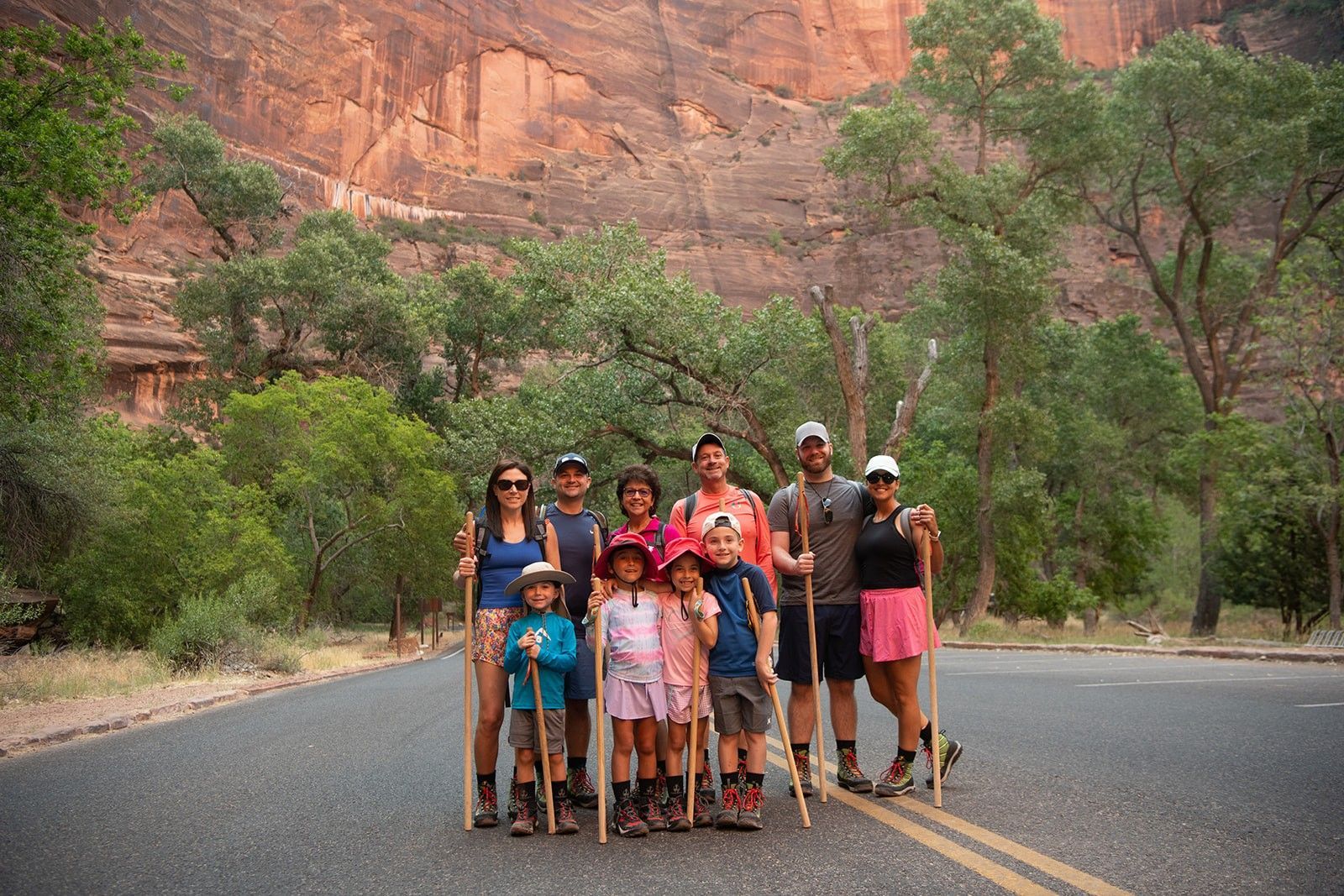 Peolpe gather along a road in Zion National Park