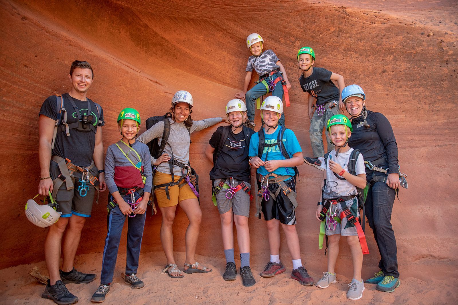 a group of people getting ready to go canyoneering 