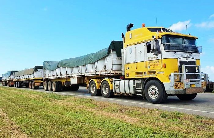 Road Train with Red Loader — Slingshot Haulage in Katherine, NT