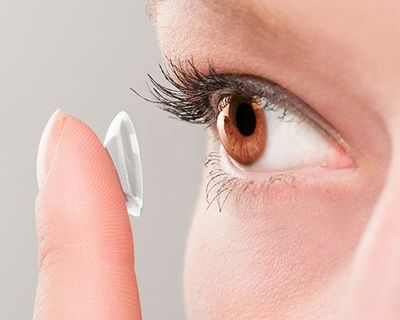 Woman Inserting a Contact Lens — South Lake Tahoe, CA — Lake Tahoe Eye Care