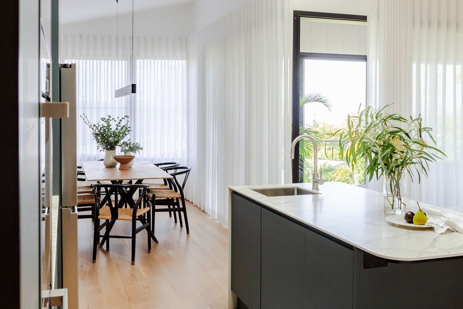 A Black Kitchen With Wooden Features  — Lake Macquarie Designer Kitchens In Morisset, NSW