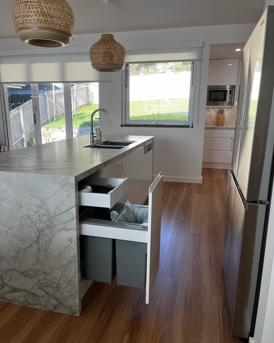 Countertop With Open Cabinet — Lake Macquarie Designer Kitchens In Caves Beach, NSW