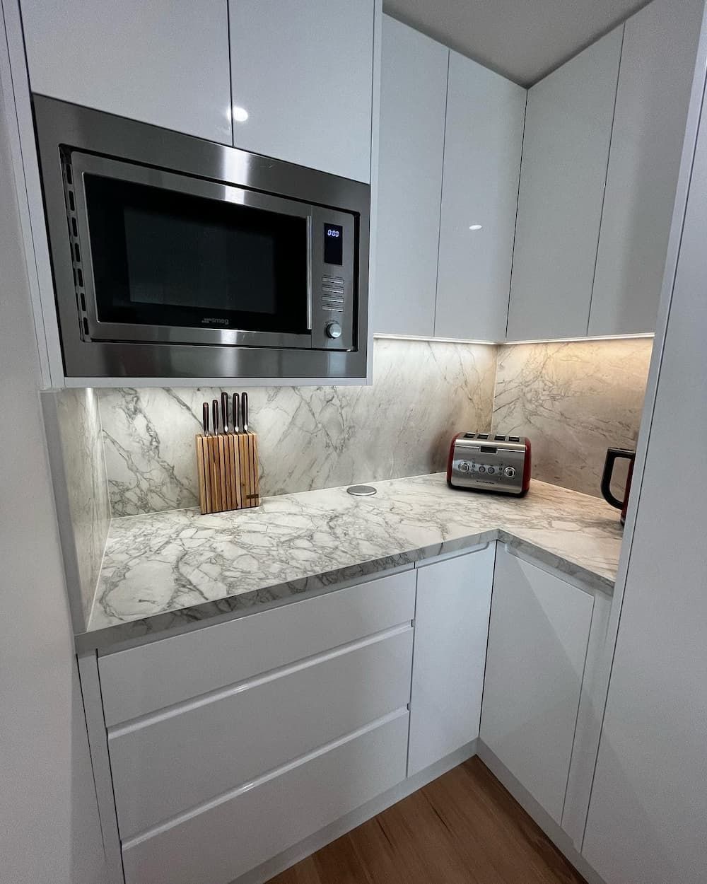 Kitchen With White Cabinets And Marble Counter Tops — Lake Macquarie Designer Kitchens In Toronto, NSW