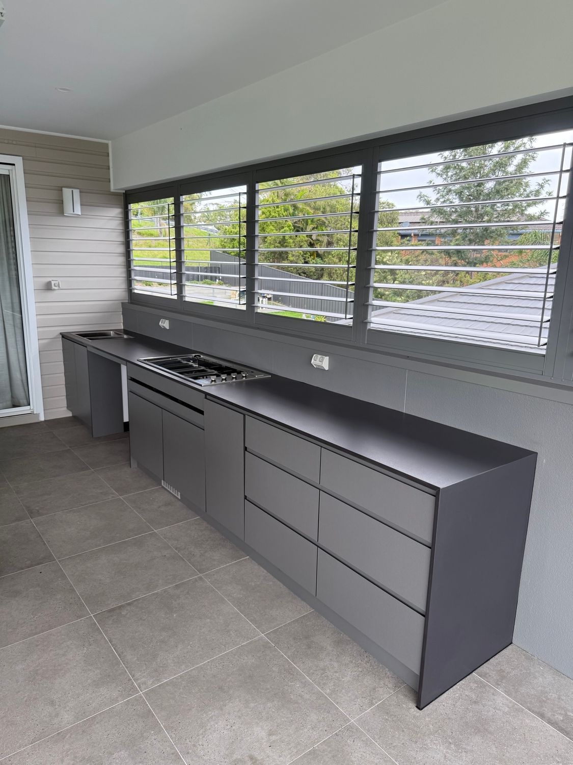 A Kitchen With a Stove, Sink, and Lots of Windows — Lake Macquarie Designer Kitchens In Morisset, NSW