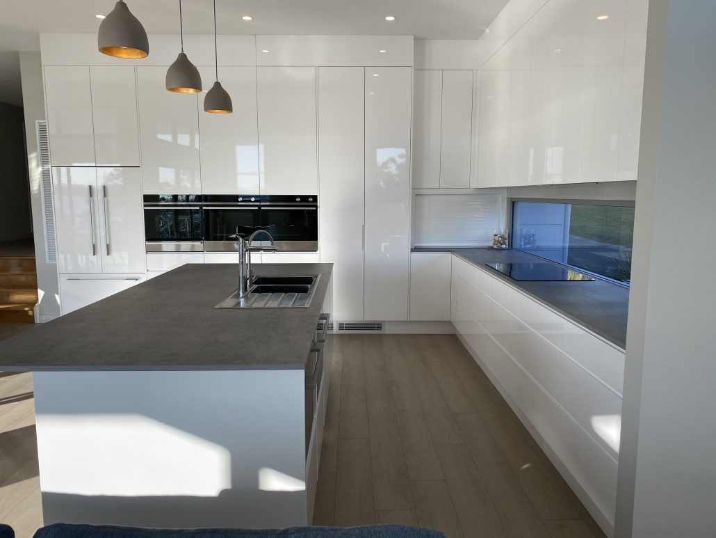 White Kitchen With Grey Benchtops — Lake Macquarie Designer Kitchens In Caves Beach, NSW