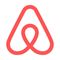 Red Airbnb logo icon on a white background