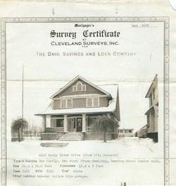 Survey certificate with a black-and-white photo of a two-story house covered in snow.