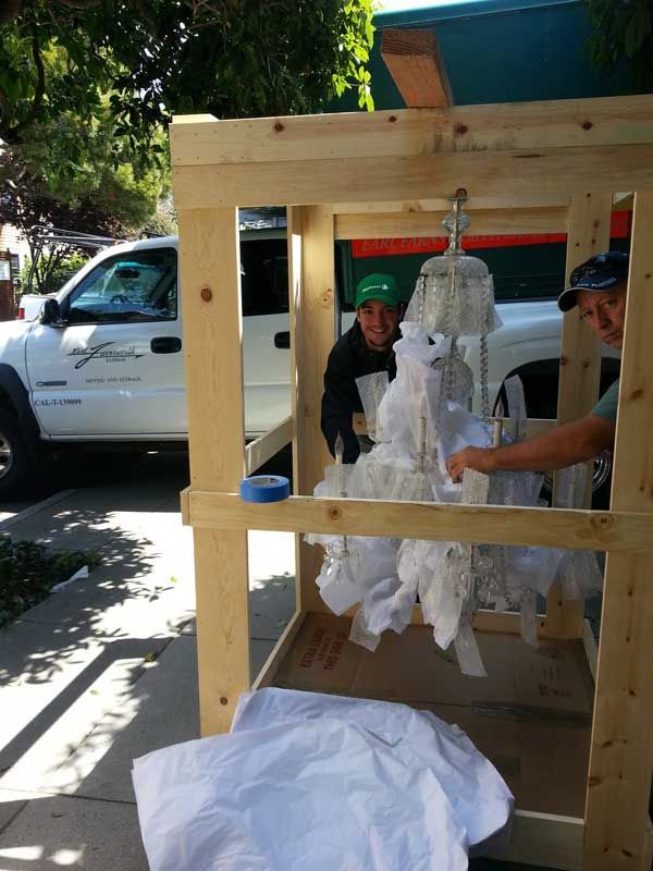 A White Truck is Parked Behind a Wooden Crate | San Rafael, CA | Earl Farnsworth Express