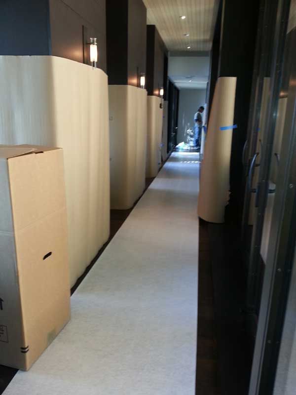 A Long Hallway with Boxes on the Side of it | San Rafael, CA | Earl Farnsworth Express