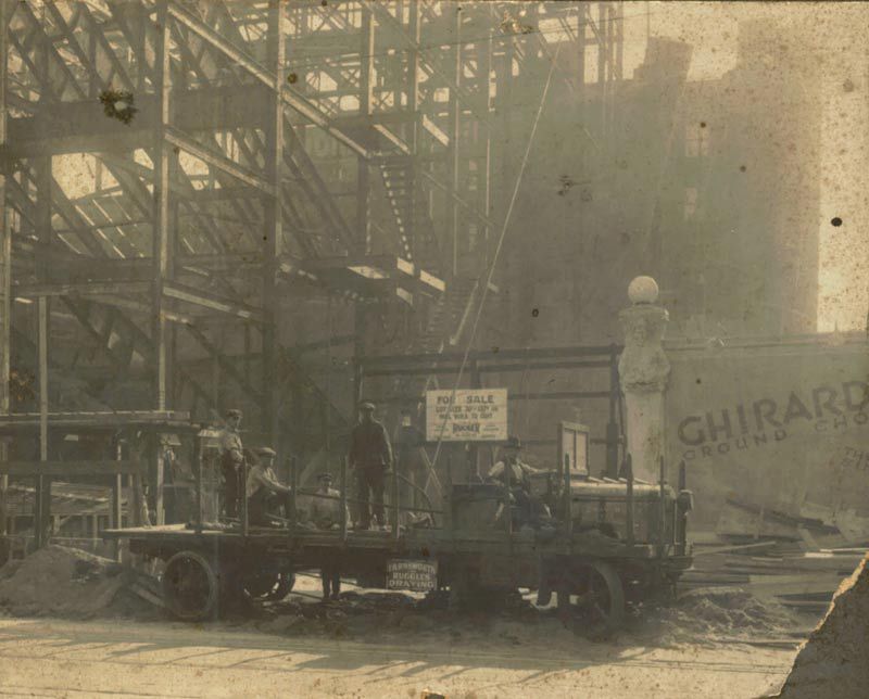 A Black and White Photo of a Truck Parked in front of a Building under Construction | San Rafael, CA |
