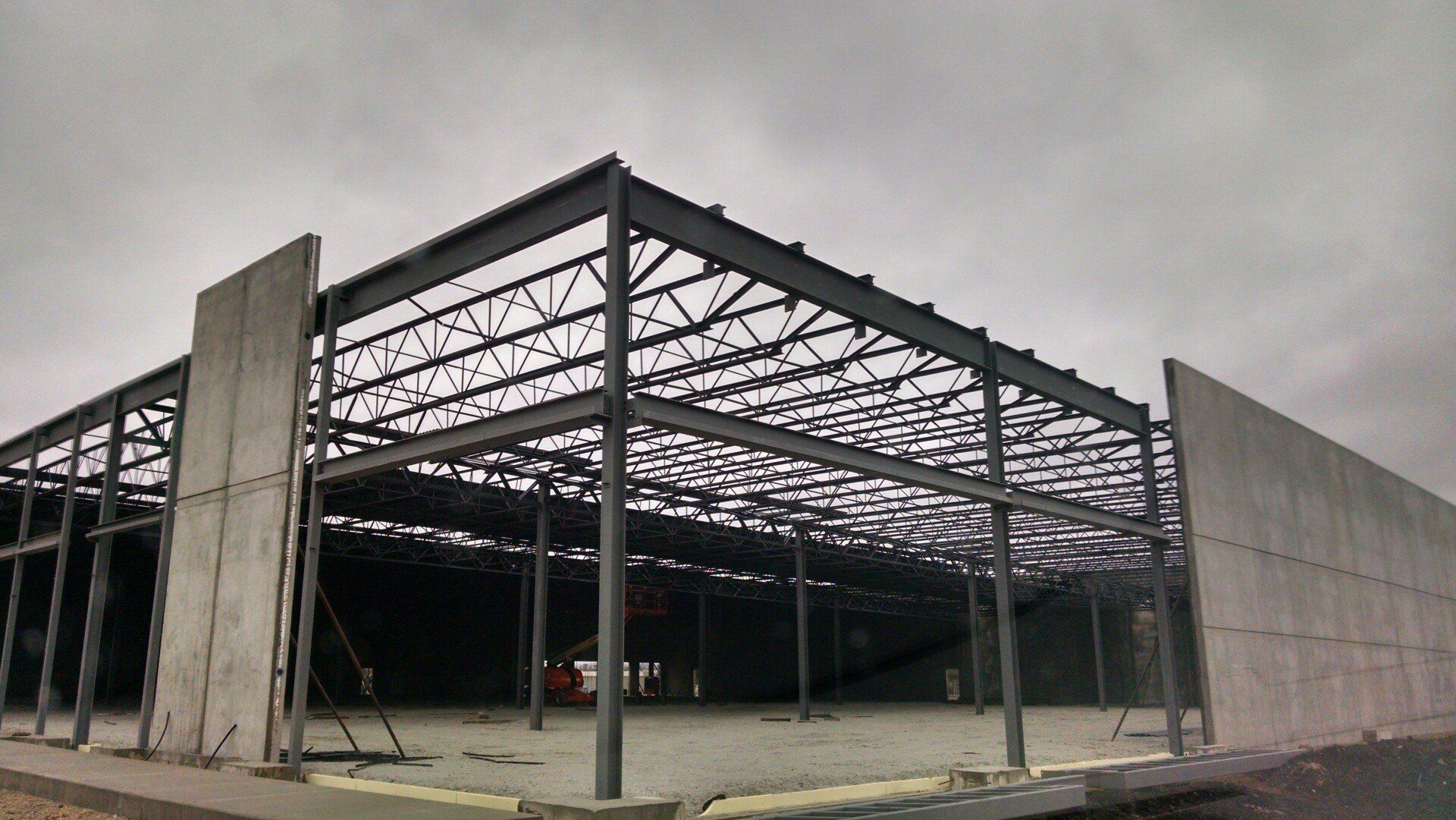 Building With Steel Foundation On Cloudy Day - Perrysburg, OH - Tech Dynamics Inc
