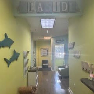 Hallway decorated with shark cutouts and a