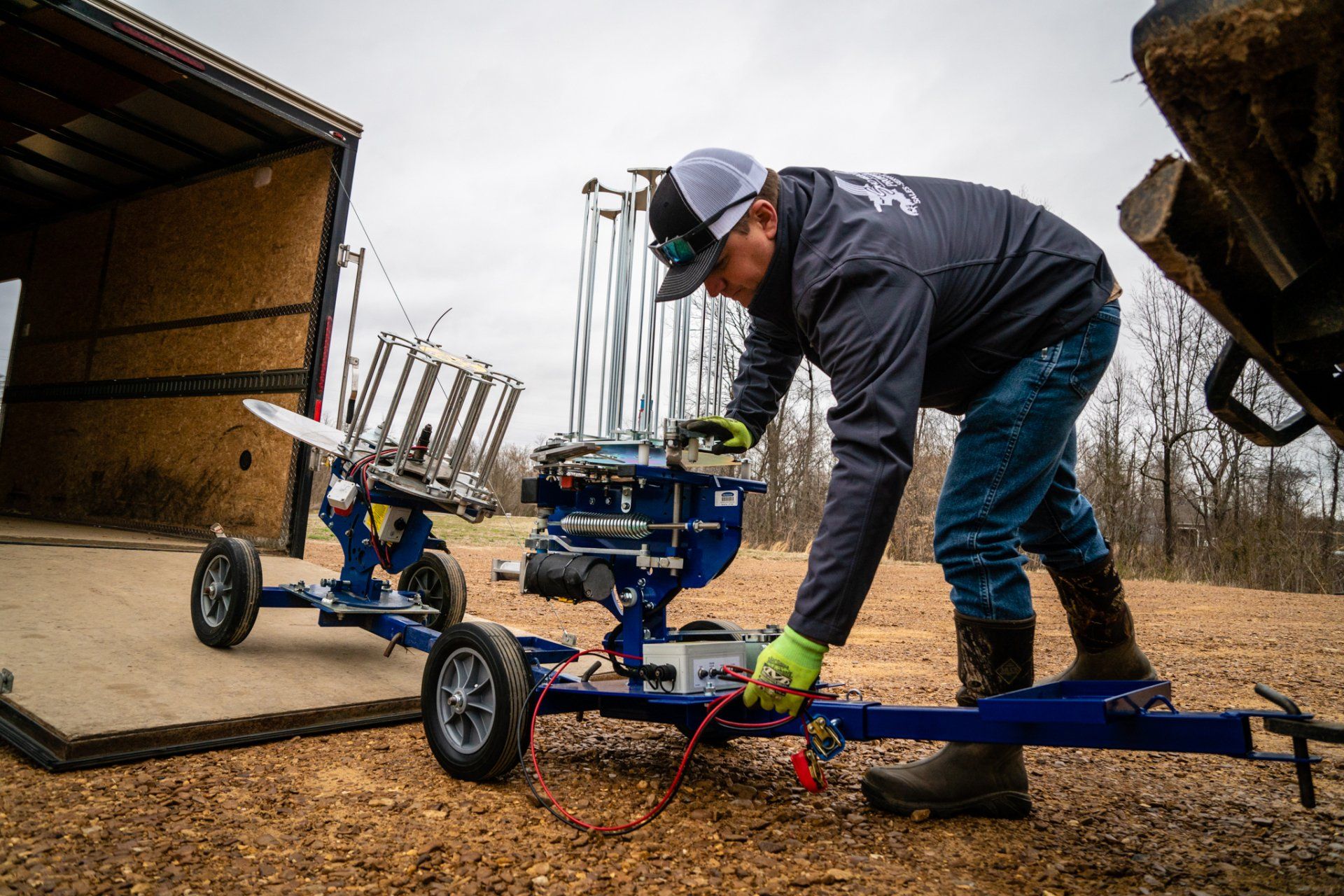 a shotgun gear employee unloading the trailer
