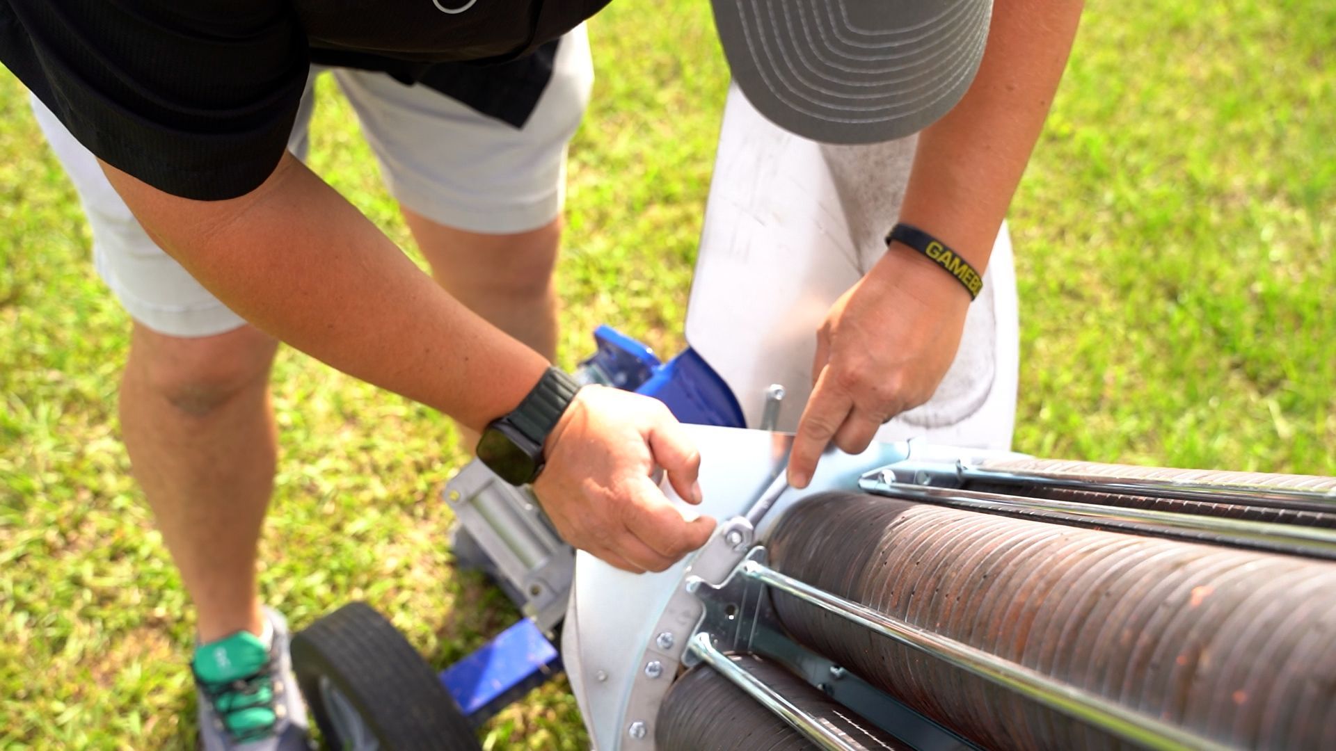 Image of a shotgun gear employee working on a machine