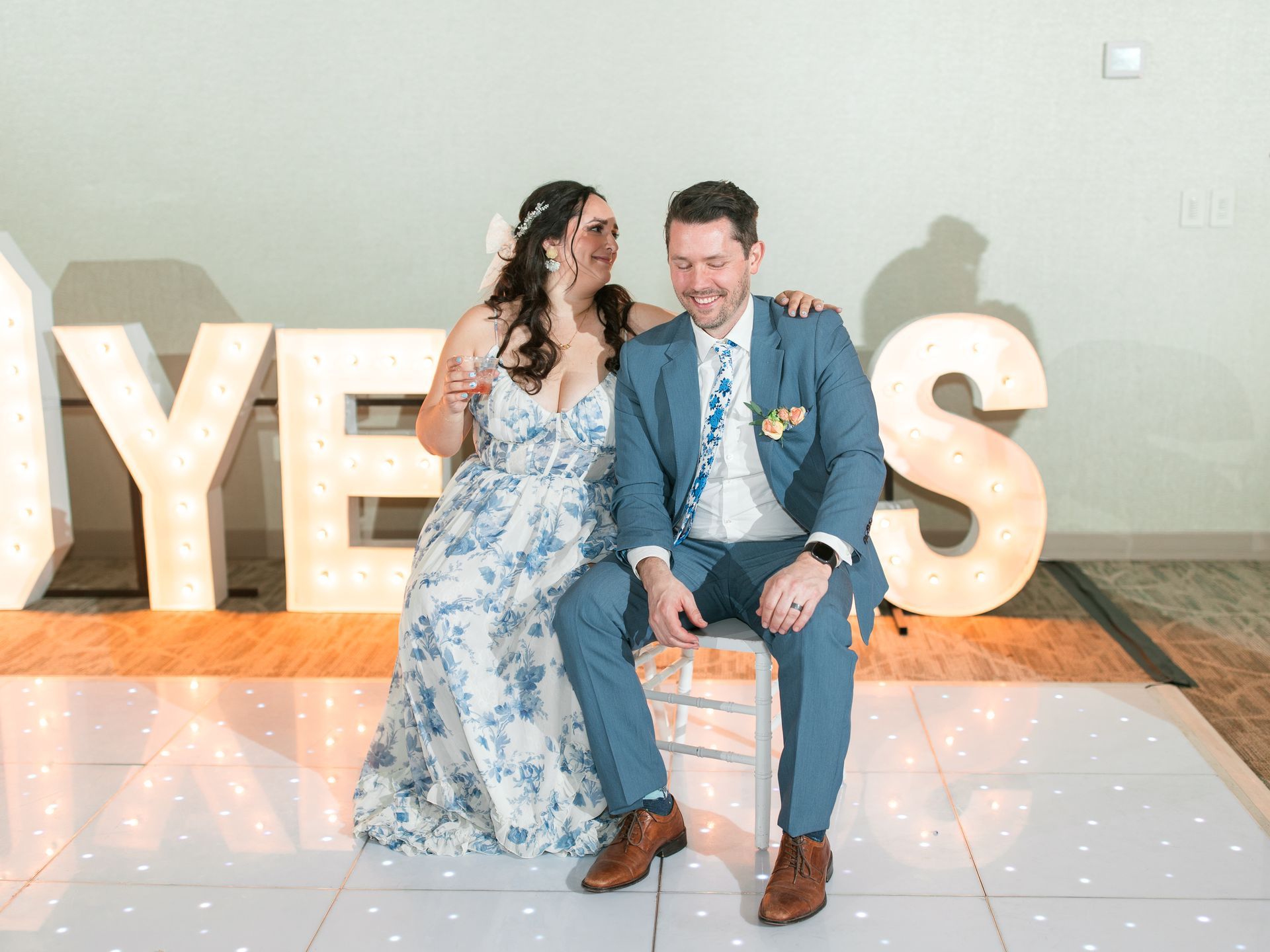 Bride and groom pose near 