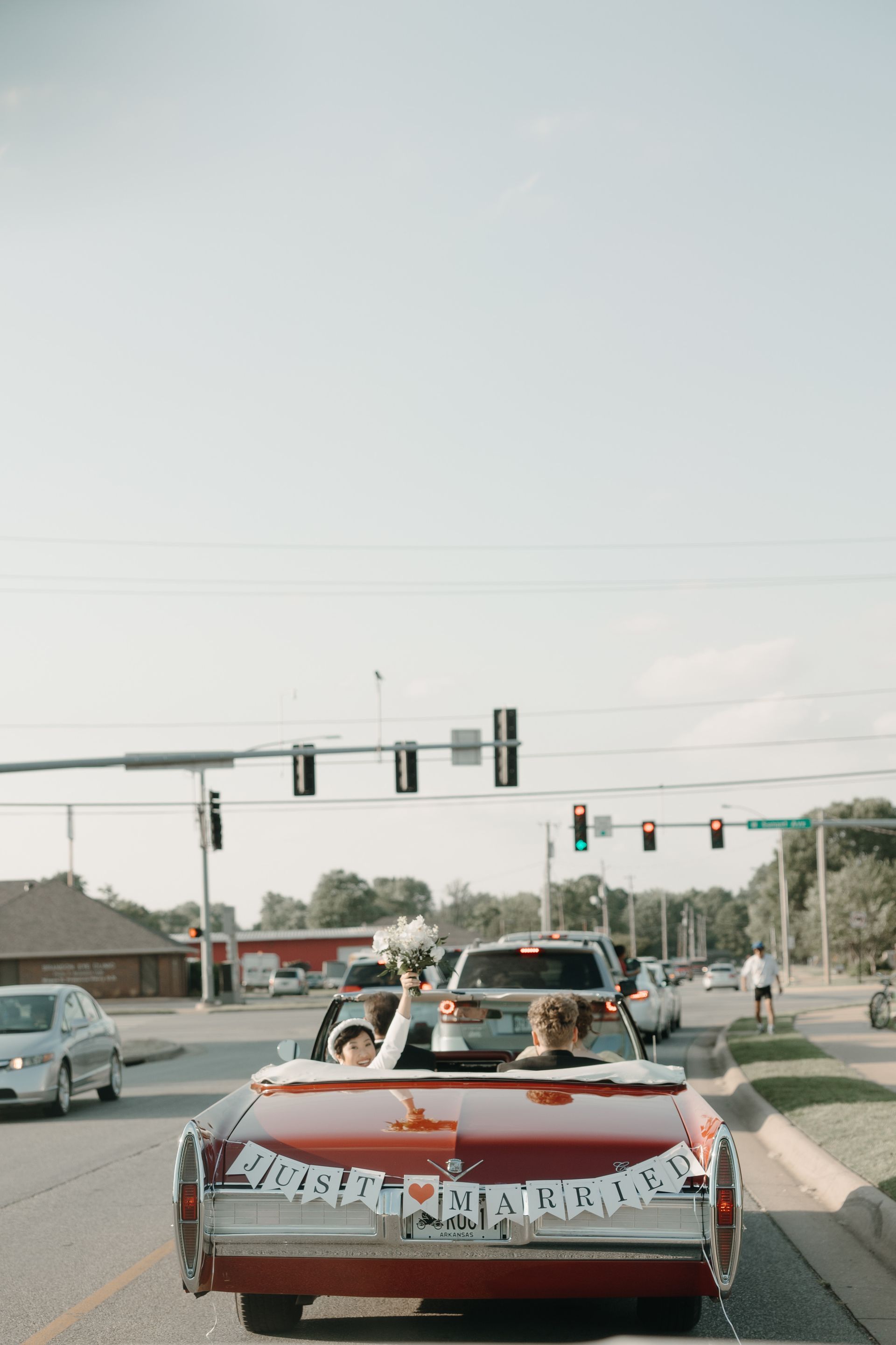 Red convertible wedding car with 