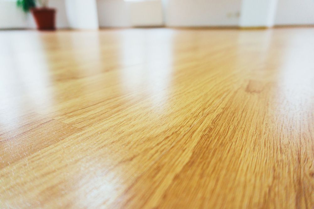 Low-angle View of a Polished Wooden Floor — Queanbeyan Carpets in Queanbeyan, NSW