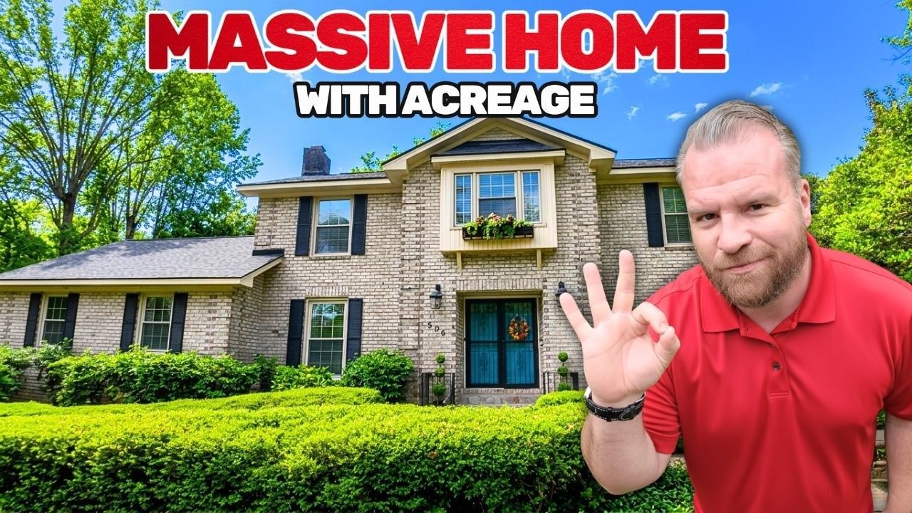 A man in a red shirt gestures