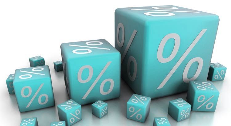 Turquoise cubes with white percent signs, suggesting financial concepts.