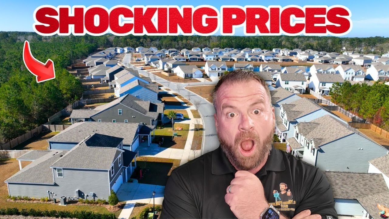 Man with surprised expression in front of houses; text 