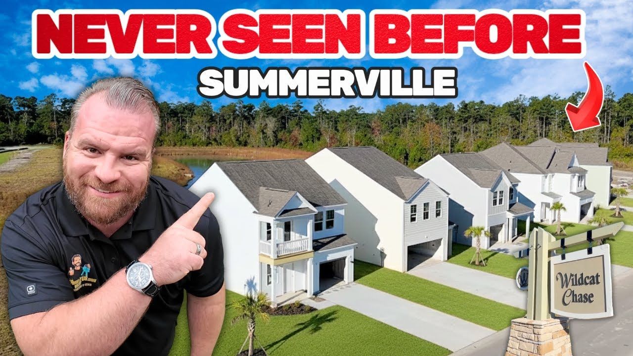 Man pointing to new homes in Summerville, South Carolina. Homes are white with green lawns.