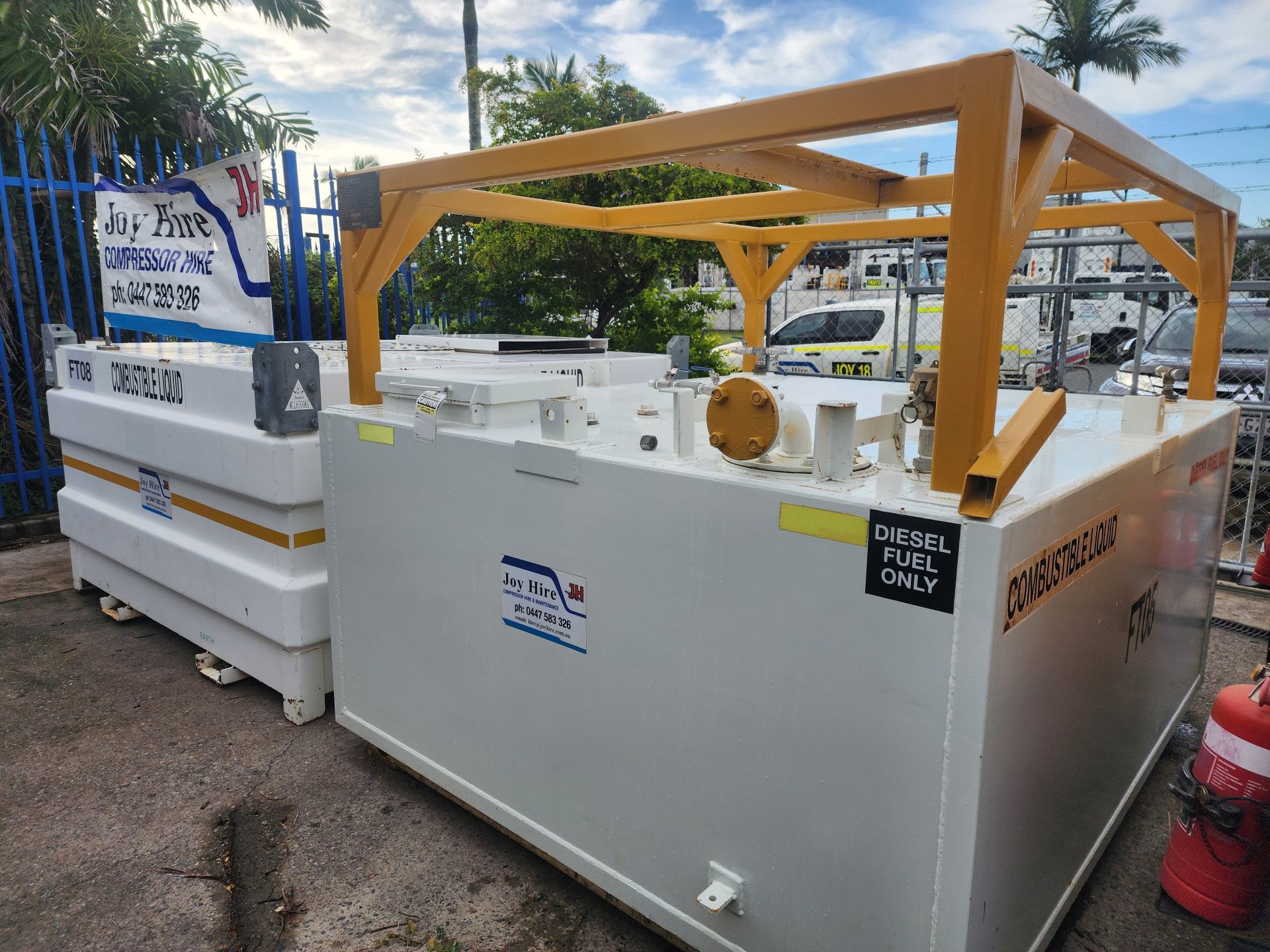 Generators Under a Roofed Shelter. Gray and Black, Outdoors — Joy Hire Compressor Hire & Maintenance in Paget, QLD