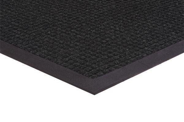 A close up of a black mat on a white background.