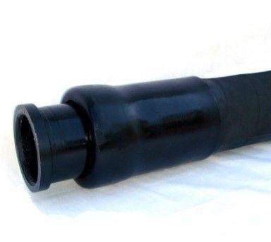 A close up of a black hose on a white surface.