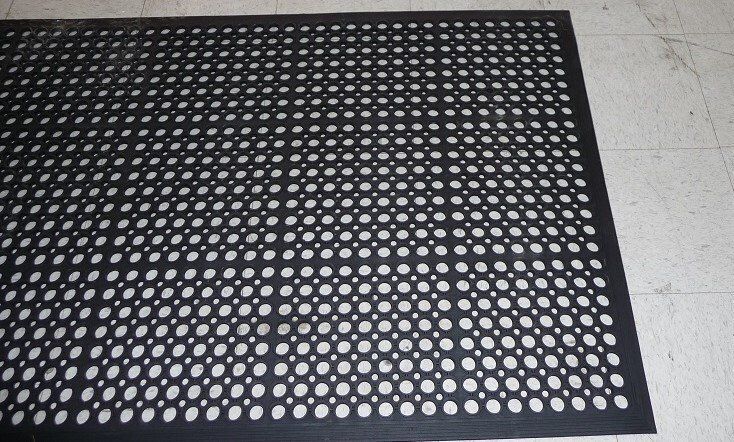 A black mat with white dots on it