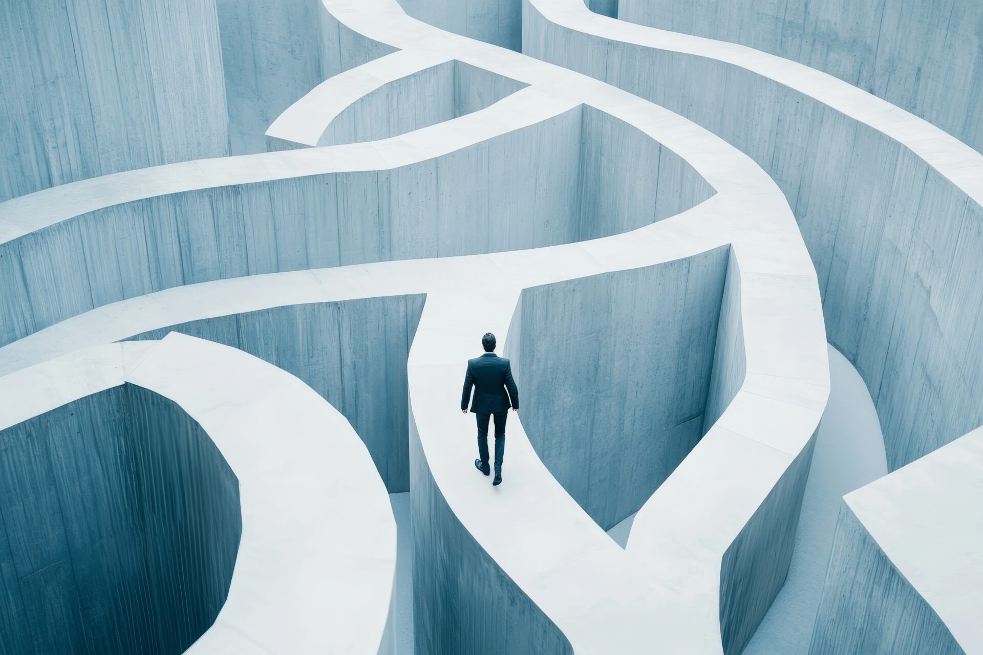 A man in a suit is walking through a maze.