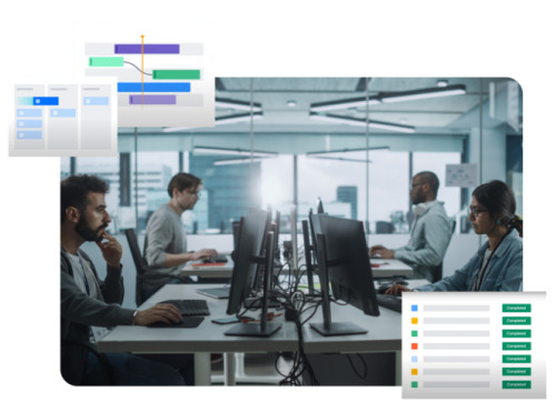 Um grupo de pessoas está sentado em mesas em um escritório trabalhando em computadores.