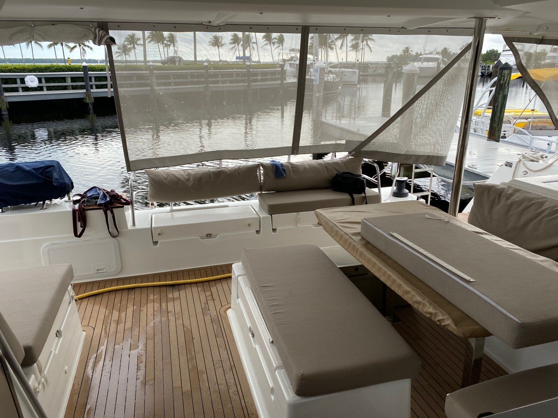 The inside of a boat with a table and couch.
