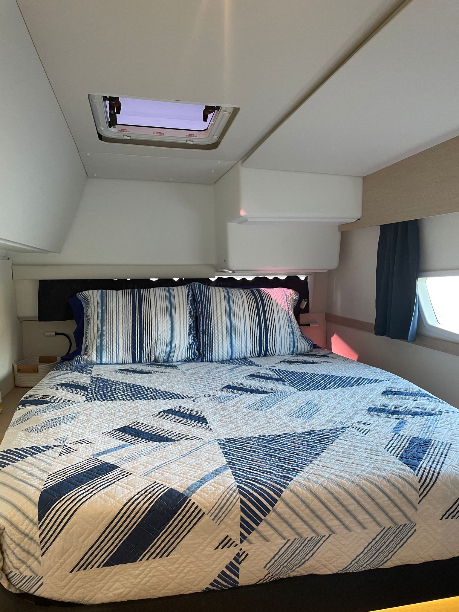 There is a large bed in the middle of the room.