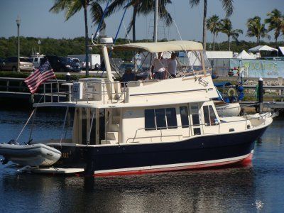 A boat with a us flag on top of it