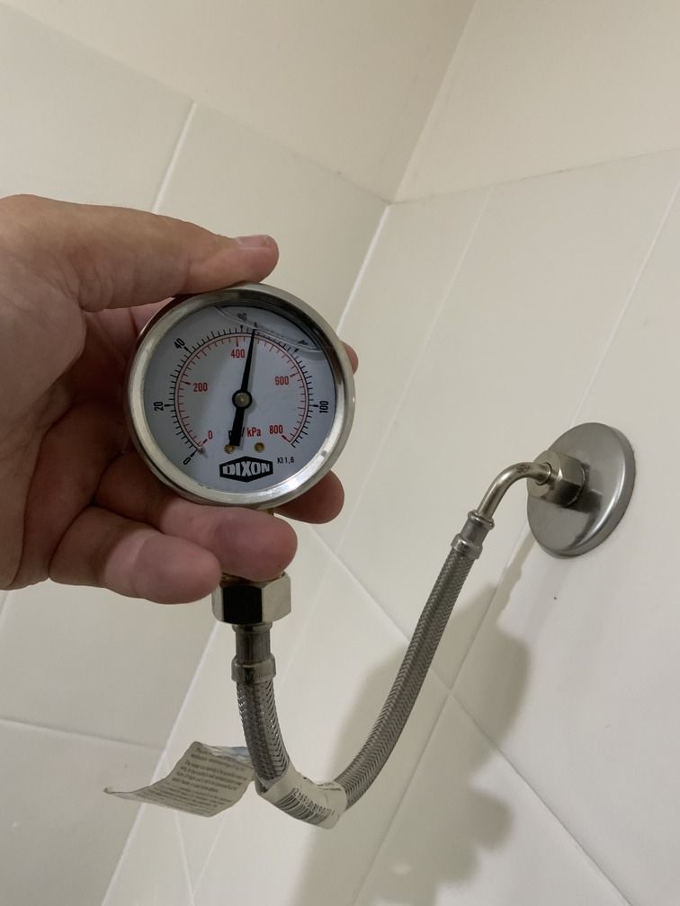 A Pipe Is Leaking Water And Steam Is Coming Out Of It — Bay City Plumbing in Sunshine Acres, QLD