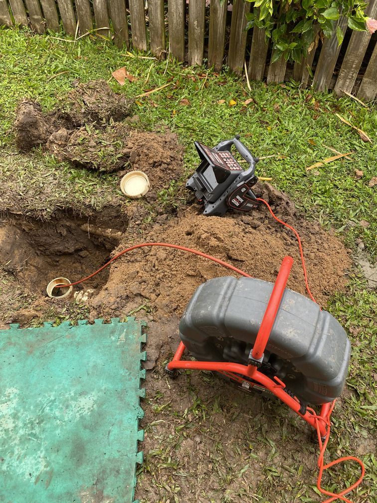 Person is Fixing a Water Heater With a Wrench — Bay City Plumbing in Eli Waters, QLD
