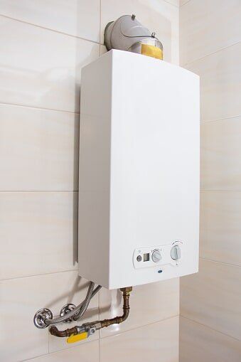 Residential Plumbing — Tankless Hot Water Heaters in Carrollton, TX Residential Plumbing — Tankless Hot Water Heaters in Carrollton, TX
