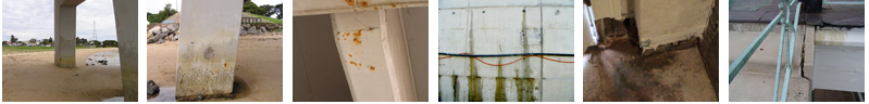 Concrete pillars with possible water damage, rust, and other deterioration.