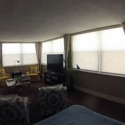 A living room filled with furniture and a flat screen tv.