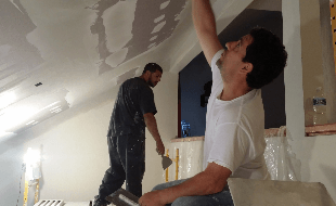 Drywall Plastering Contractor — Two Man Plastering The Ceiling in East Providence, RI