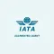 Un logo pour un agent accrédité iata avec des ailes et un globe.