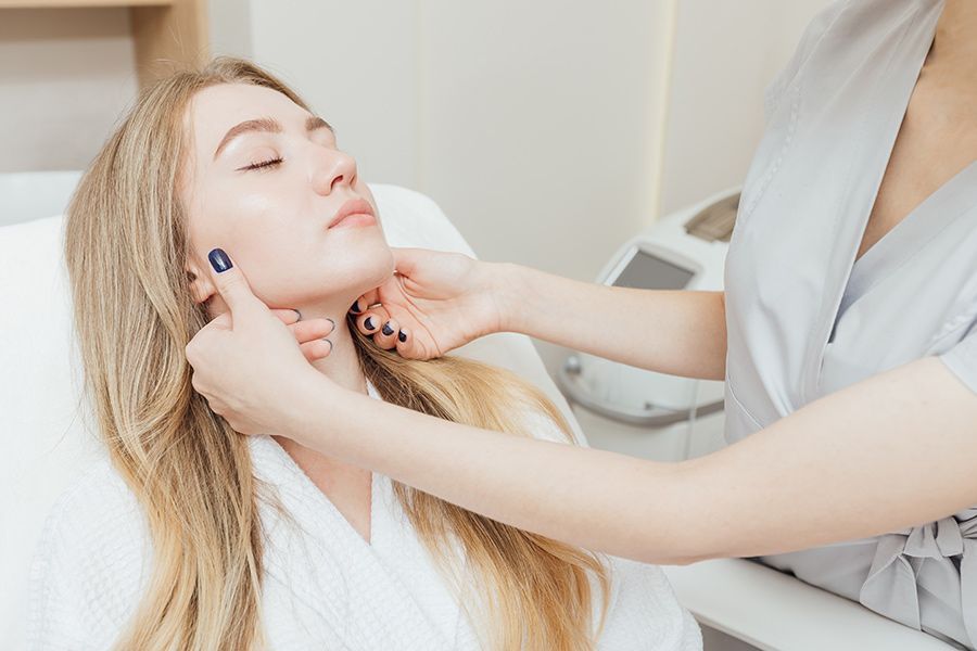A Woman is Getting a Facial Treatment at a Beauty Salon — Organic Beauty by Kessie in Yeppoon, QLD