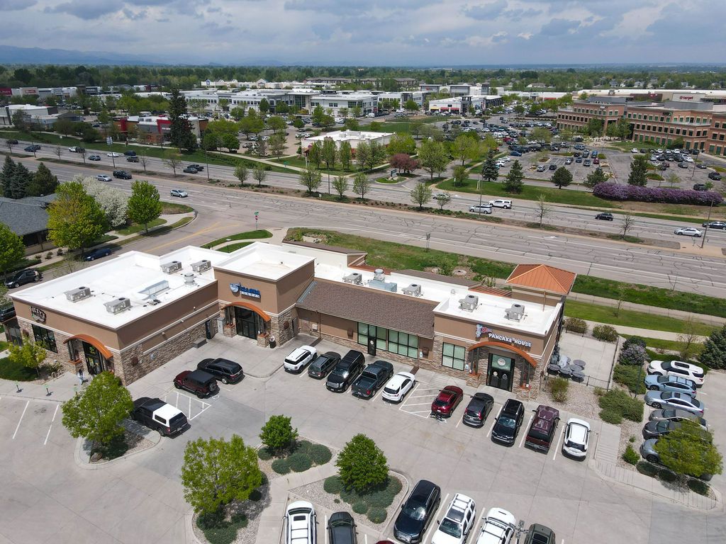 A blue background with white text that says photo coming soon