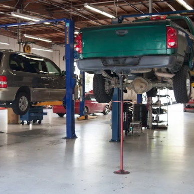 Pick Up Truck on the Lift in Our Garage in Rancho Cordova, CA | Lee's Auto Repair Service